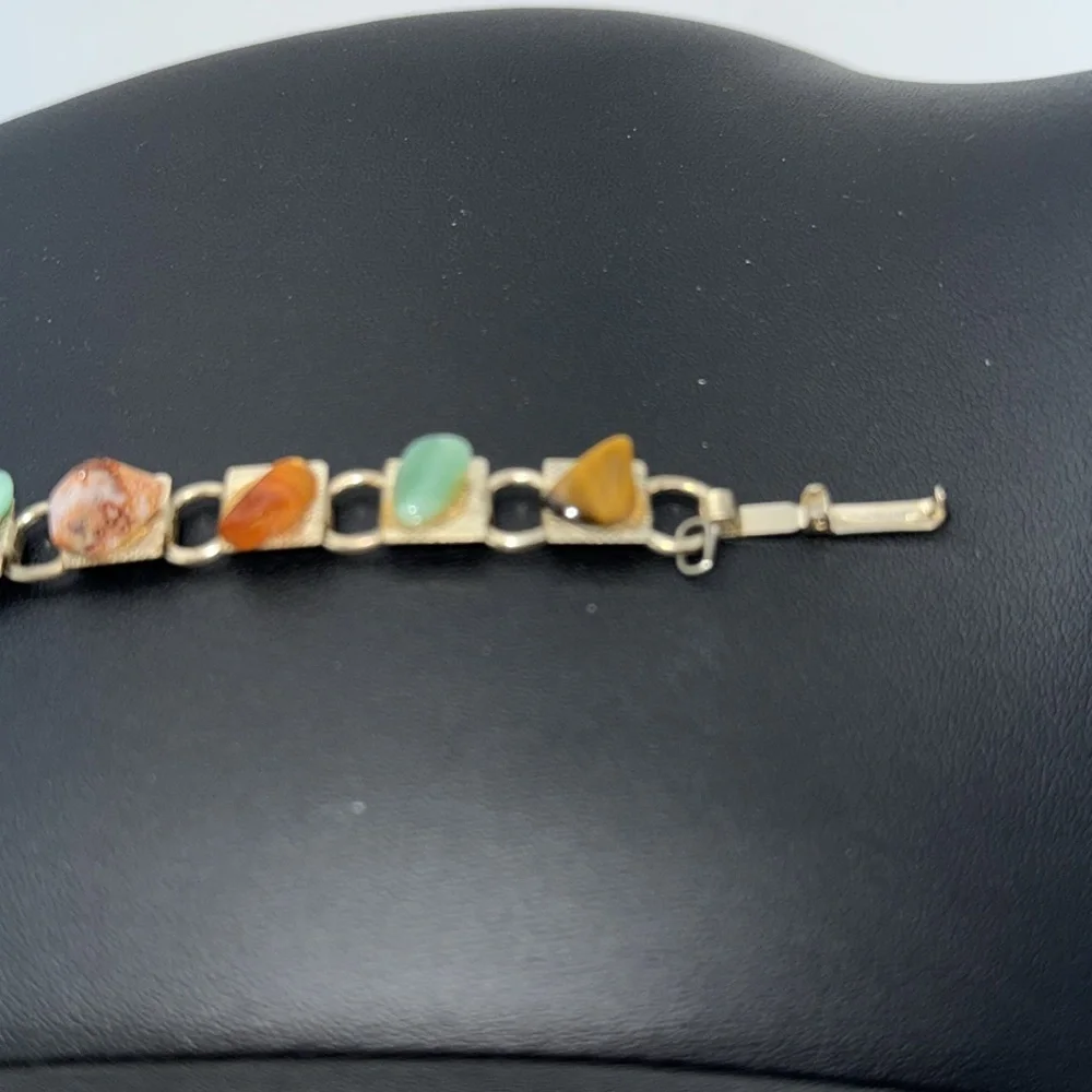 Vintage Gold tone link charm bracelet with various colored “stones” boho hippie